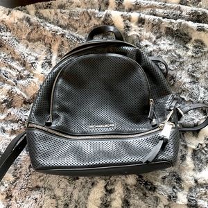 Black• Michael Kors backpack